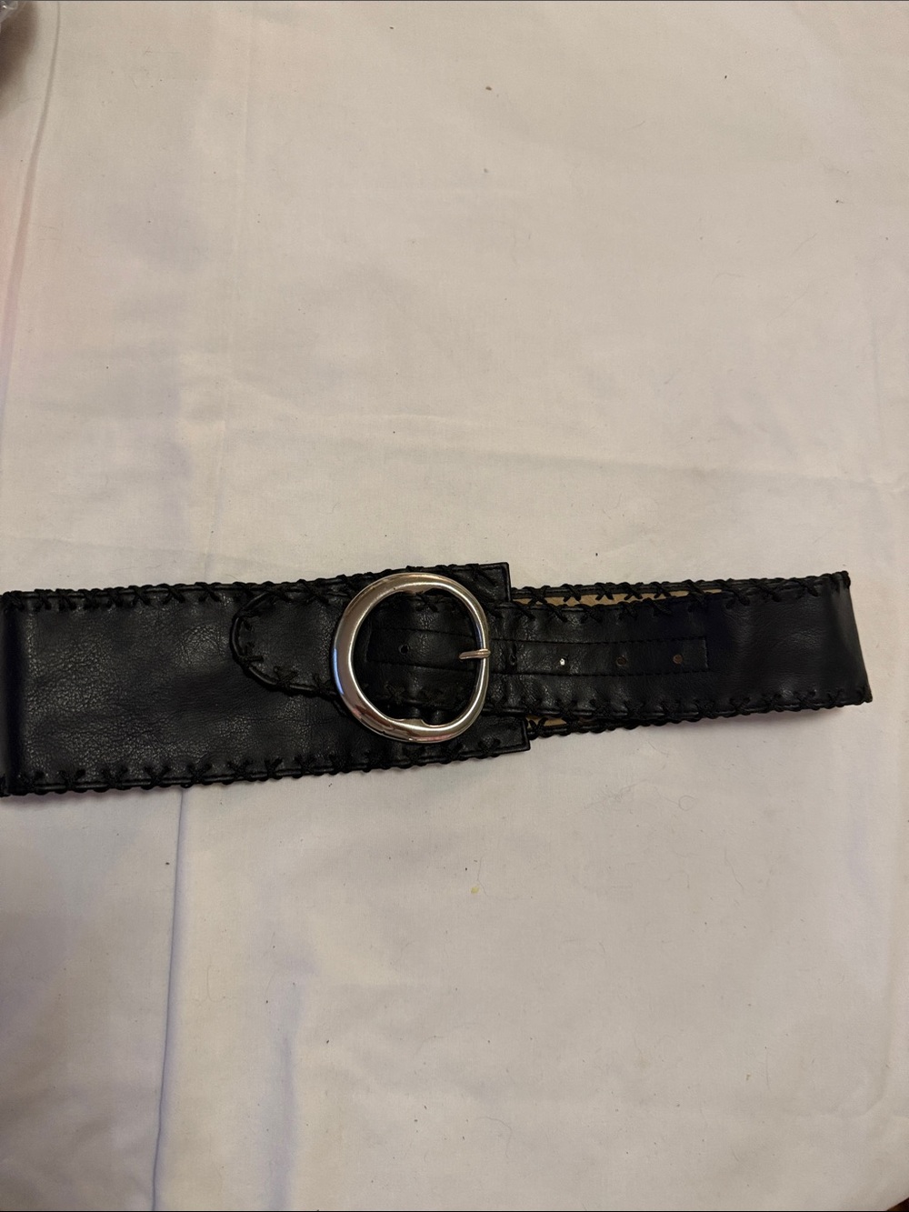 Express Black Leather Belt with Silver Oval Buckle. Very pretty offset front.  M